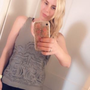 Anthropology faux leather cut out shirt.